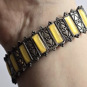 Yellow bracelet silver tone panels stretch stretchy